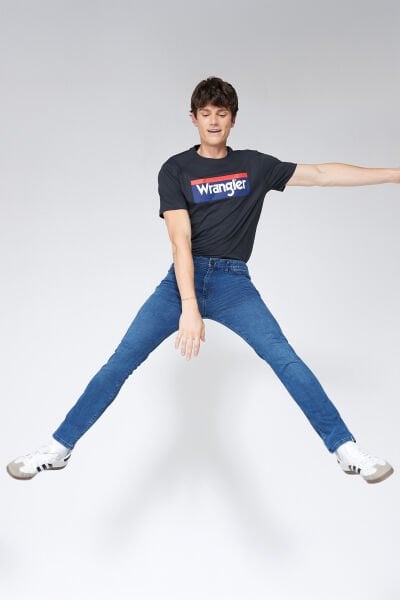 Wrangler W12SMN396 Orta Mavi Erkek Texas Slim Kot Pantolon