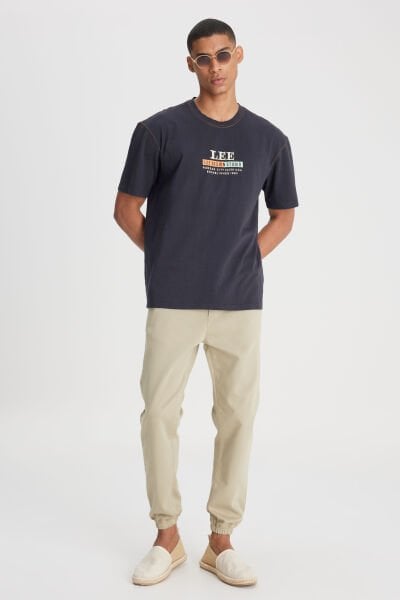 Lee LM04009299 Jogger Non Denim Açık Yeşil Erkek Belden Lastikli Ve İp Detaylı Pantalon